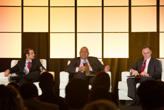 Colin Hector, attorney for the division of financial practices at the FTC, and Calvin Hagins, deputy assistant director for originations at the CFPB, discuss auto regulation on a panel moderated by John Redding, partner at Buckley Sandler LLP.