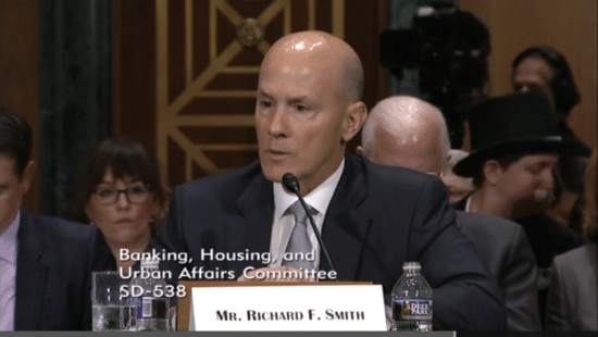 Former Equifax chief executive Richard Smith testifying before Congress.