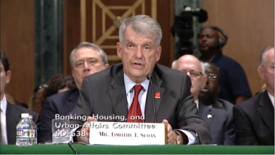 President and Chief Executive of Wells Fargo & Co. Timothy Sloan speaks before the Senate Banking, Housing, and Urban Affairs Committee.