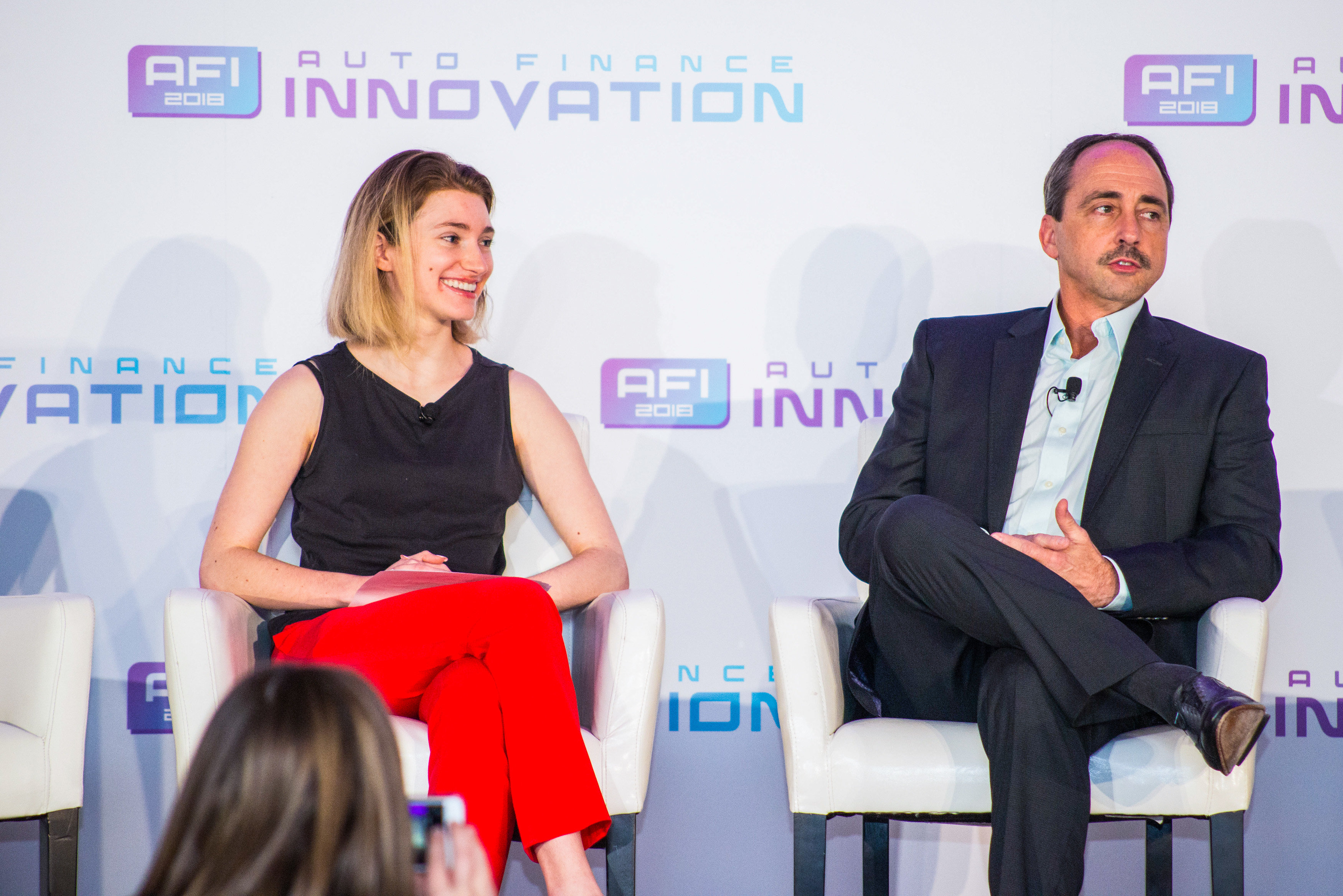 Larry Dominique, president and chief executive at Group PSA North America, sits down for a "fireside chat" at Auto Finance Innovation 2018 in San Francisco. (Photo by Lensology.net)
