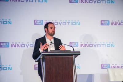 Matthieu Soulé, deputy chief executive at L’Atelier BNP Paribas North America, gives a presentation at Auto Finance Innovation 2018. (Photo by Lensology.net)