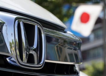 honda vehicle with japan flag in background
