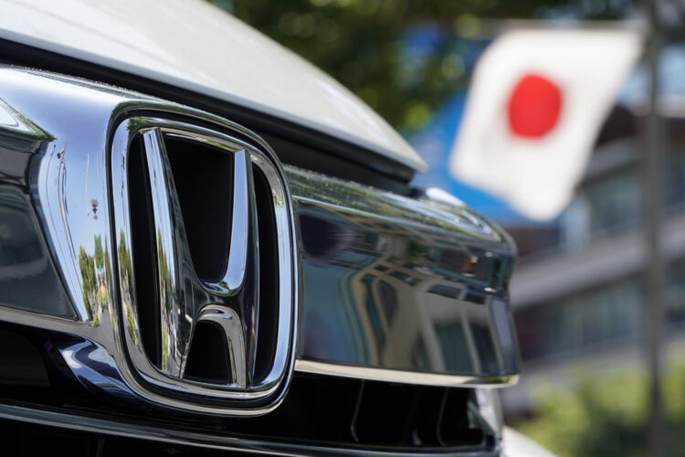 honda vehicle with japan flag in background