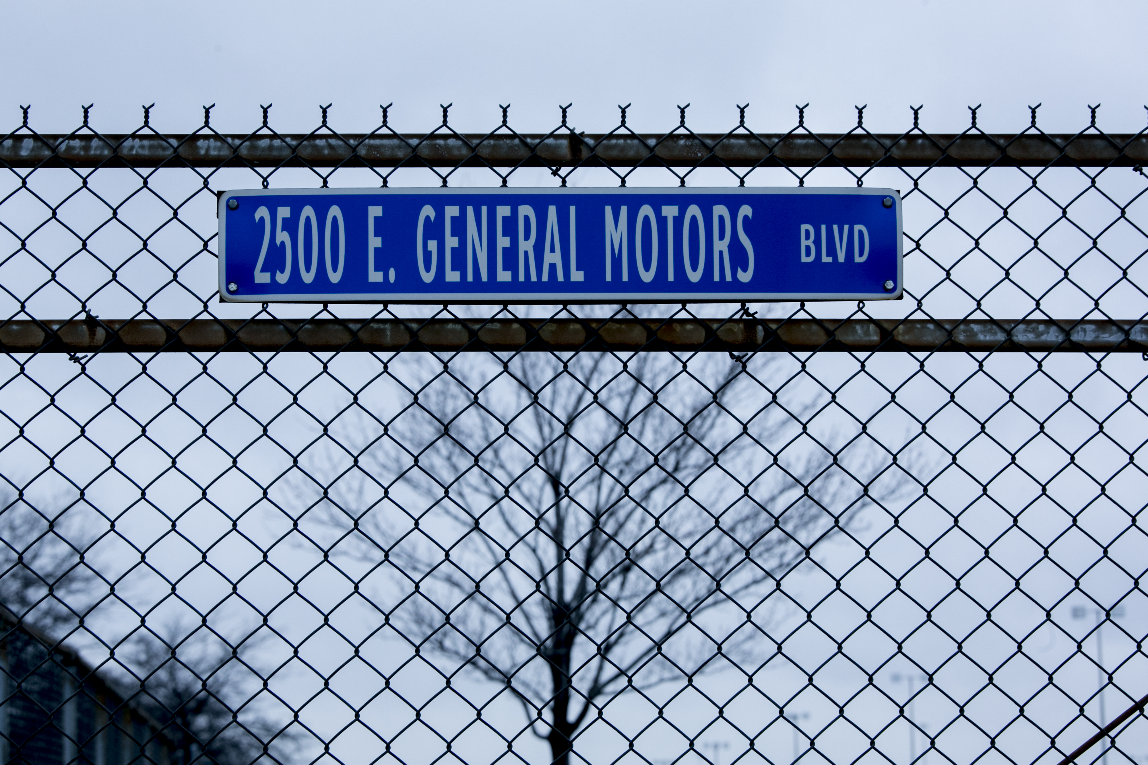 A road sign for East General Motors Boulevard hangs outside the General Motors Co. Detroit-Hamtramck assembly plant in Detroit, Michigan, U.S., on Monday, Nov. 26, 2018. General Motors Co. will cut more than 14,000 salaried staff and factory workers and close seven factories worldwide by the end of next year, part of a sweeping realignment to prepare for a future of electric and self-driving vehicles. Photographer: Anthony Lanzilote/Bloomberg