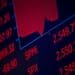 A monitor displays stock market information on the floor of the New York Stock Exchange (NYSE) in New York, U.S., on Thursday, March 12, 2020.