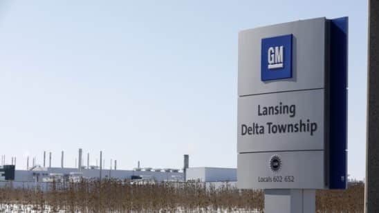 Signage is displayed outside the General Motors Co. Lansing Delta Township Assembly Plant stands in Lansing, Michigan, U.S., on Friday, Feb. 21, 2020.