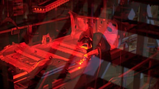 Tesla plans no-pay furloughs, salary cuts while plants idled