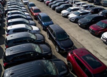 General Motors Co. vehicles are displayed at a car dealership in this aerial image over Tinley Park, Illinois in 2019.
