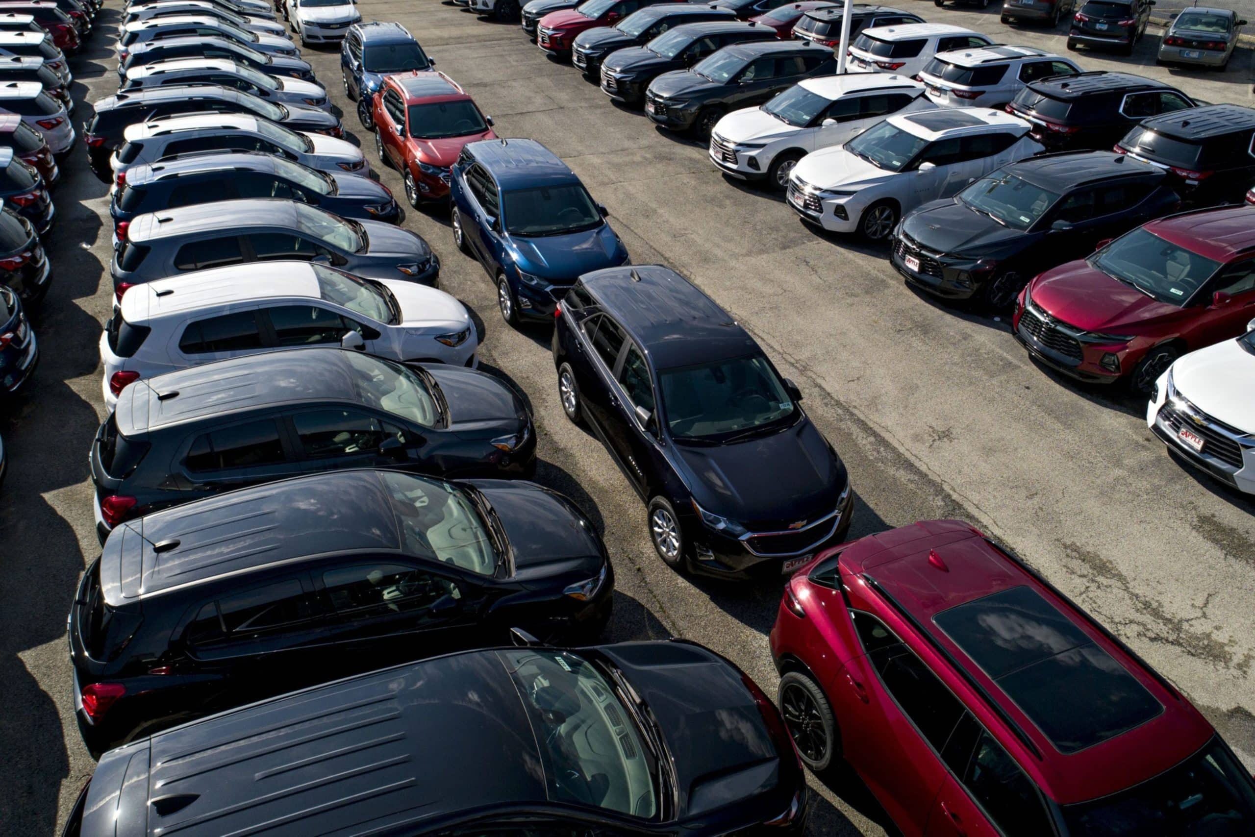 General Motors Co. vehicles are displayed at a car dealership in this aerial image over Tinley Park, Illinois in 2019.