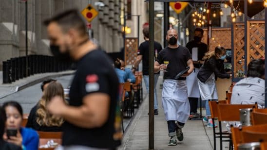 US jobless claims show scant improvement at 840,000 last week