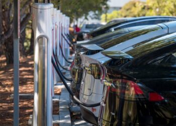 tesla charging station with EVs