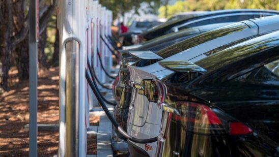 tesla charging station with EVs