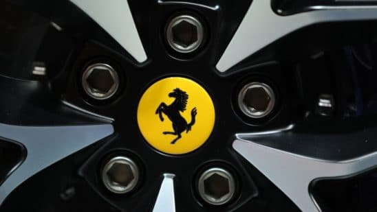 Ferrari posts steady profit before outsider CEO takes helm