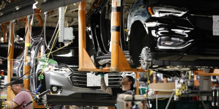 Auto forecaster slashes outlook by most since chip woes emerged