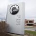 A pedestrian walks past signage for a BRP manufacturing facility in Valcourt, Quebec, Canada, on Wednesday, Oct. 28, 2020. BRP Inc. says production shutdowns depleted its inventory and dragged down revenues in its second quarter, but rising demand buoyed profits as fun-seekers turned to power sports for pandemic recreation, The Toronto Star reported. Photographer: Christinne Muschi/Bloomberg