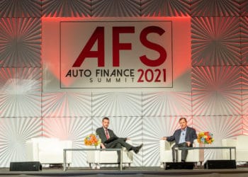 At AFS from left: Joey Pizzolato, editor of Auto Finance News; Jim Drotman, EVP of U.S., Canada and International Markets, Ford Credit. Photo credit: Renowned Photos