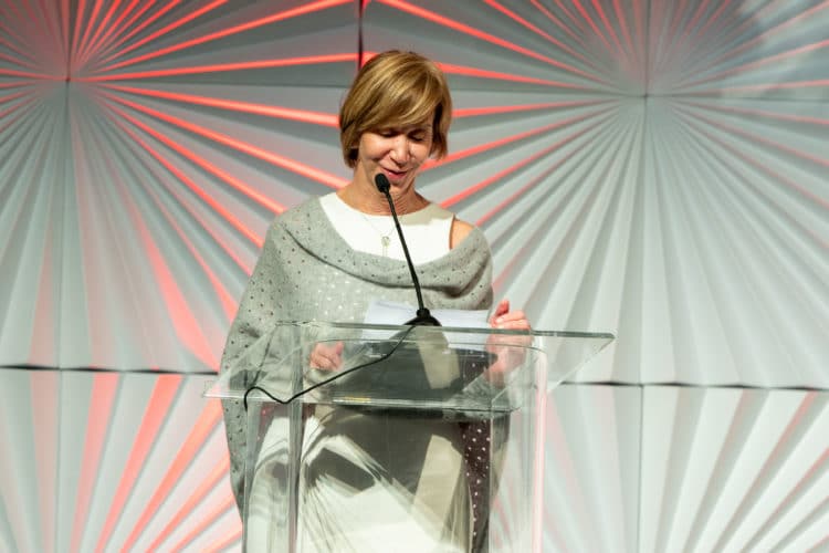 Sandra Broderick, former SEVP and head of operations, Santander Consumer USA accepts her award at the Auto Finance Summit in Las Vegas Photographer: Renowned Photos/Auto Finance News