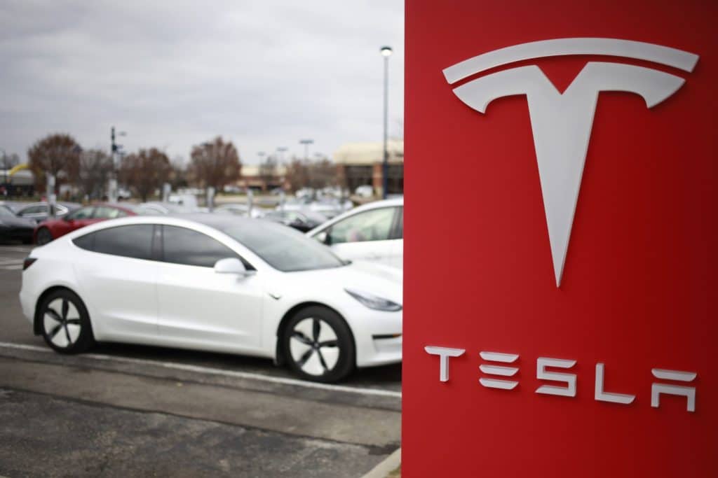 Tesla Inc. signage outside a dealership at the Easton Town Center shopping mall in Columbus, Ohio, U.S., on Friday, Dec. 10, 2021.