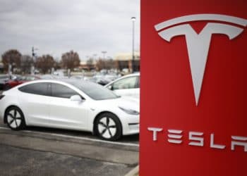 Tesla Inc. signage outside a dealership at the Easton Town Center shopping mall in Columbus, Ohio, U.S., on Friday, Dec. 10, 2021.