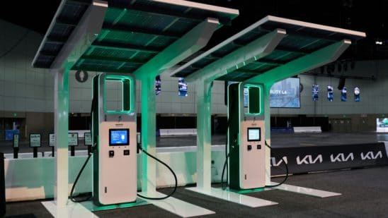 Electrify America electric vehicle (EV) charging stations on display at AutoMobility LA ahead of the Los Angeles Auto Show in Los Angeles, California, U.S., on Thursday, Nov. 18, 2021. Covid-19 canceled the Los Angeles Auto Show in 2020 and now that the show is back, some automakers have decided they didn't need it anyway.
