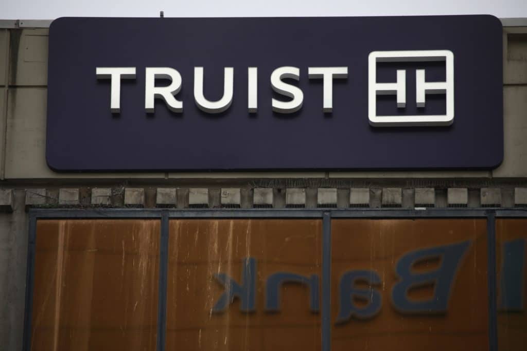 Signage outside a Truist Financial Corp. bank branch in Lexington, Kentucky, U.S., on Sunday, Jan. 16, 2022. Truist Financial reported adjusted earnings per share for the fourth quarter that beat the average analyst estimate.