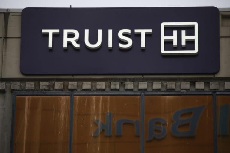 Signage outside a Truist Financial Corp. bank branch in Lexington, Kentucky, U.S., on Sunday, Jan. 16, 2022. Truist Financial reported adjusted earnings per share for the fourth quarter that beat the average analyst estimate.