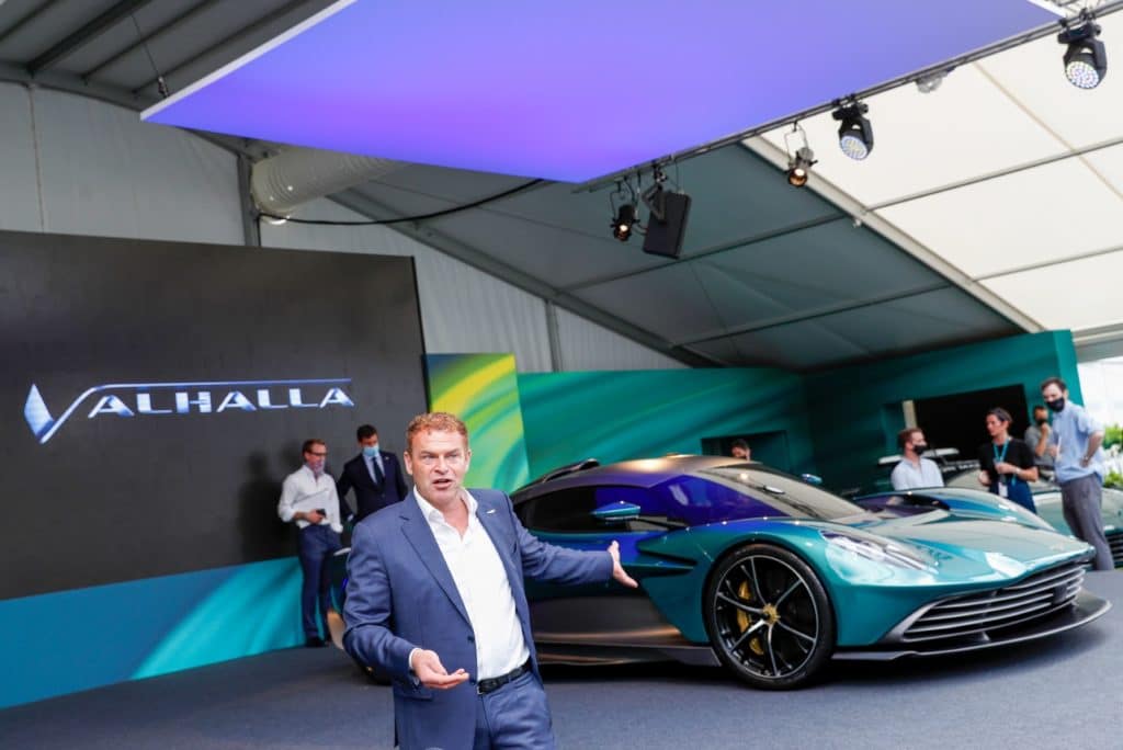 Tobias Moers, chief executive officer of Aston Martin Lagonda Global Holdings Plc, speaks during the reveal of the Valhalla plug-in hybrid supercar, manufactured by Aston Martin Lagonda Global Holdings Plc, in Silverstone, U.K., on Thursday, July 15, 2021. The 950-horsepower plug-in hybrid, boasting futuristic lines and a distinct front, will be the middle child of Aston Martin's mid-engine sports car line, priced below the 2.5 million-pound ($3.5 million) Valkyrie and above the Vantage.