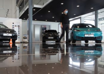 A VW showroom in Berlin featuring several electric models.