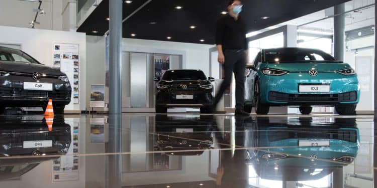A VW showroom in Berlin featuring several electric models.