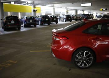 Rental vehicles parked at a Hertz location at the Louisville International Airport in Louisville, Kentucky, U.S., on Thursday, Jan. 20, 2022. The U.S. car rental industry achieved overall revenues of $28.1 billion in 2021 - a 21% gain over the pandemic year of 2020, according to data collected by Auto Rental News. Photographer: Luke Sharrett/Bloomberg