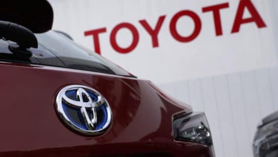 A Toyota Motor Co. badge is seen on a Corolla Touring wagon displayed outside a dealership in Tokyo, Japan, on Sunday, May 10, 2020. Global automakers and suppliers are on track to get at least $100 billion of bank financing as the coronavirus pandemic hammers car sales. Photographer: Toru Hanai/Bloomberg