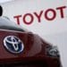 A Toyota Motor Co. badge is seen on a Corolla Touring wagon displayed outside a dealership in Tokyo, Japan, on Sunday, May 10, 2020. Global automakers and suppliers are on track to get at least $100 billion of bank financing as the coronavirus pandemic hammers car sales. Photographer: Toru Hanai/Bloomberg