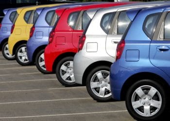 General Motors Chevrolet Aveo compact cars sit on a dealership lot in Wake Forest, North Carolina, U.S., on Saturday, June 27, 2009. General Motors Corp. (GM) is poised to follow rival Chrysler LLC's path and win approval to sell most of its assets at a hearing set to start today, putting President Barack Obama's administration almost a month ahead of schedule in its plan to reshape the U.S. auto industry. Photographer: Jim R. Bounds/Bloomberg News