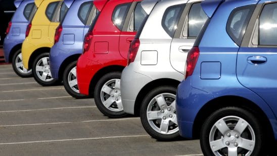 General Motors Chevrolet Aveo compact cars sit on a dealership lot in Wake Forest, North Carolina, U.S., on Saturday, June 27, 2009. General Motors Corp. (GM) is poised to follow rival Chrysler LLC's path and win approval to sell most of its assets at a hearing set to start today, putting President Barack Obama's administration almost a month ahead of schedule in its plan to reshape the U.S. auto industry. Photographer: Jim R. Bounds/Bloomberg News