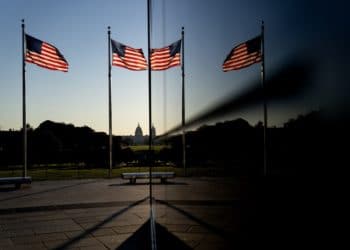 American flags in front of the U.S. Capitol in Washington, D.C., U.S.