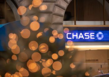 Signage at a Chase bank branch in New York, U.S., on Thursday, Jan. 13, 2022. JPMorgan Chase & Co. posted a decline in trading revenue that was steeper than analysts expected, and both commercial and consumer loans fell from a year earlier.