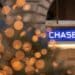 Signage at a Chase bank branch in New York, U.S., on Thursday, Jan. 13, 2022. JPMorgan Chase & Co. posted a decline in trading revenue that was steeper than analysts expected, and both commercial and consumer loans fell from a year earlier.