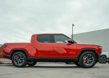 The Rivian R1T electric vehicle (EV) pickup truck outside the company's manufacturing facility in Normal, Illinois, US., on Monday, April 11, 2022. Rivian Automotive Inc. produced 2,553 vehicles in the first quarter as the maker of plug-in trucks contended with a snarled supply chain and pandemic challenges.