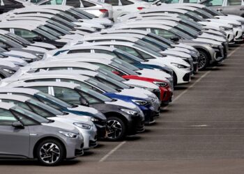 Newly-manufactured electric vehicles (EV) in a storage lot at the Volkswagen AG (VW) electric automobile plant in Zwickau, Germany