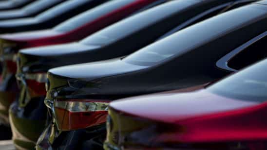 A row of 2016 Toyota Motor Corp. Camry vehicles sit on display for sale on the lot of the Peoria Toyota Scion car dealership in Peoria, Illinois, U.S.