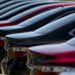 A row of 2016 Toyota Motor Corp. Camry vehicles sit on display for sale on the lot of the Peoria Toyota Scion car dealership in Peoria, Illinois, U.S.
