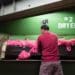 A worker checks dried dyed fiber at a raw stock dye house in Philadelphia, Pennsylvania.