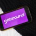 The logo for Getaround Inc. is displayed on a smartphone in an arranged photograph taken in the Brooklyn borough of New York, U.S., on Wednesday, June 10, 2020. Car-sharing platforms, which have suffered during the Covid-19 lockdown, see an opportunity emerging: an increase in short-distance, local trips as U.S. consumers look for a different way of getting to work and running errands.
