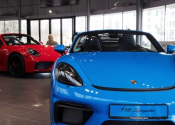 A Porsche 718 Spyder automobile at a Porsche SE showroom in Berlin, Germany, on Tuesday, March 29, 2022. Porsche, which reports reports final year earnings today, delivered 301,915 vehicles to customers in 2021, an 11% jump from 2020 and the first time it has surpassed the 300,000 mark.