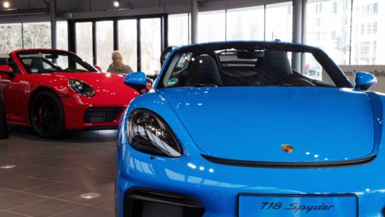 A Porsche 718 Spyder automobile at a Porsche SE showroom in Berlin, Germany, on Tuesday, March 29, 2022. Porsche, which reports reports final year earnings today, delivered 301,915 vehicles to customers in 2021, an 11% jump from 2020 and the first time it has surpassed the 300,000 mark.