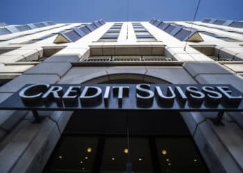 A sign above the entrance to a Credit Suisse Group AG bank branch in Geneva, Switzerland, on Monday, July 25, 2022. Credit Suisse report 2Q earnings on July 27.