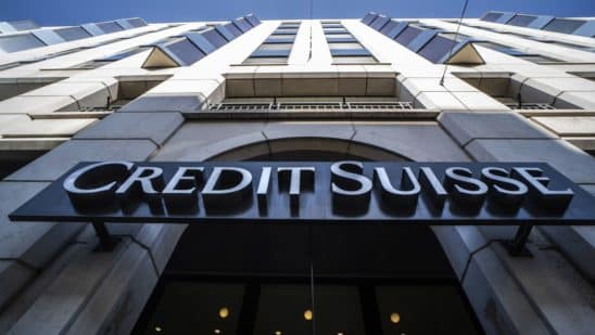 A sign above the entrance to a Credit Suisse Group AG bank branch in Geneva, Switzerland, on Monday, July 25, 2022. Credit Suisse report 2Q earnings on July 27.