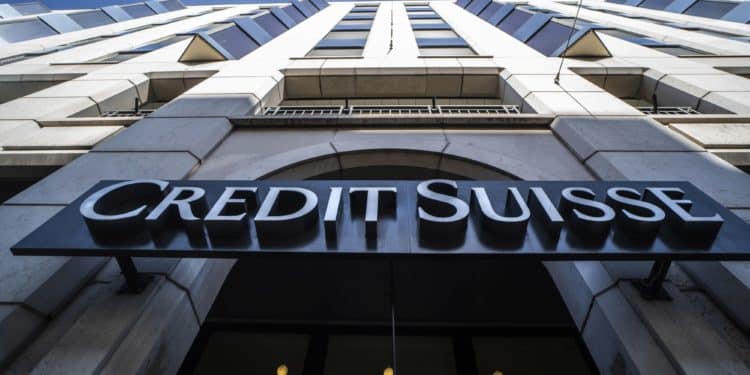 A sign above the entrance to a Credit Suisse Group AG bank branch in Geneva, Switzerland, on Monday, July 25, 2022. Credit Suisse report 2Q earnings on July 27.