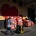 A worker at a wholesale produce market in the Union Market district in Washington, D.C.. Photographer: Al Drago/Bloomberg