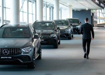Automobiles on display inside a Mercedes-Benz AG showroom in Berlin, Germany, on Tuesday, Feb. 24, 2022. Mercedes-Benz expects profitability at its main cars division to slip this year as the German manufacturer sees more drag from supply-chain snarls and a surge in raw-material costs.